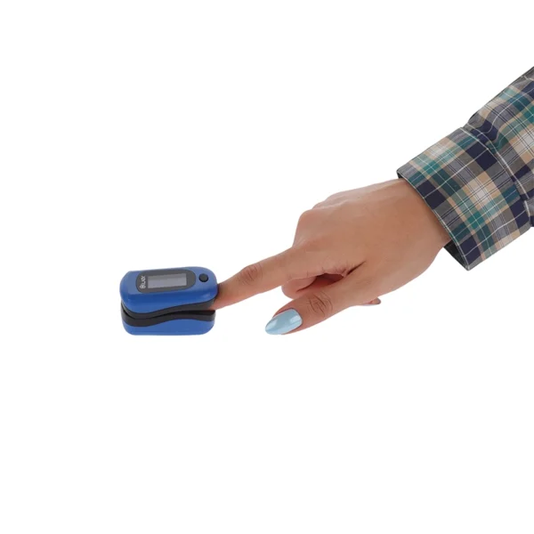 Fingertip pulse oximeter in use